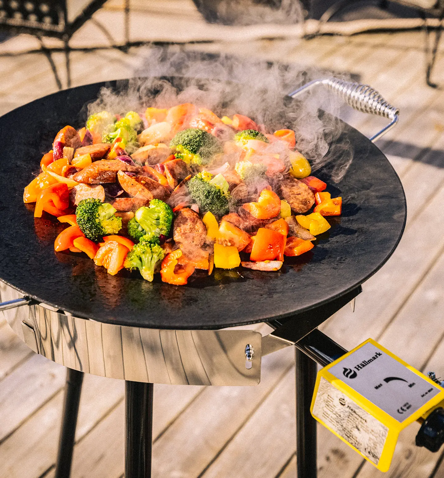 Traktør-stekehelle med gassbrenner ø58cm Sort  - Miljøbilde Merkevare - 5 Ekstra utsnitt av Traktør-stekehelle med gassbrenner ø58cm Sort (produktet) i brukssituasjon